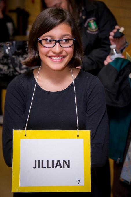 A contestant is all smiles after the completion of the Spelling Bee