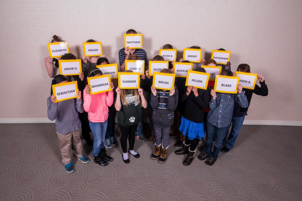 All of the Spelling Bee Contestants show their name tags
