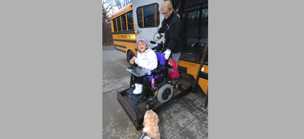 Special Ed bus driver and little girl