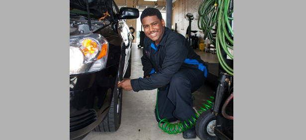 A KTC student working on car tires