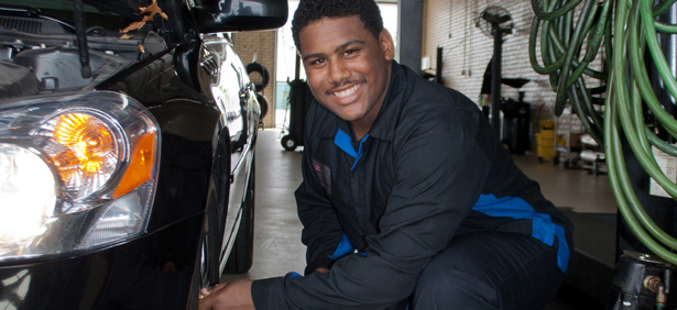 KTC Automotive student working on car