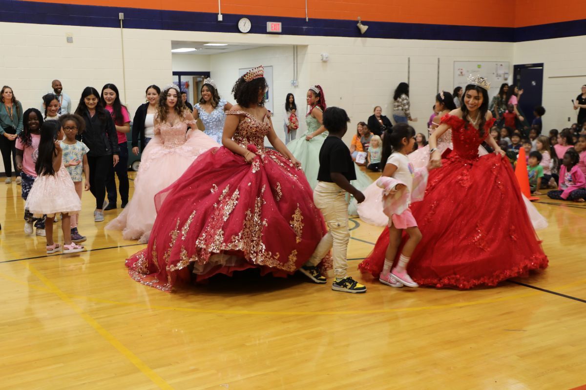 Students dancing in traditional Mexican costumes